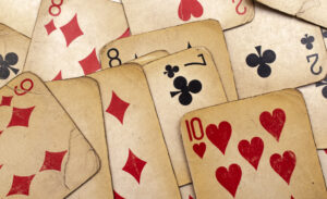 Close up photo of old yellowed playing cards